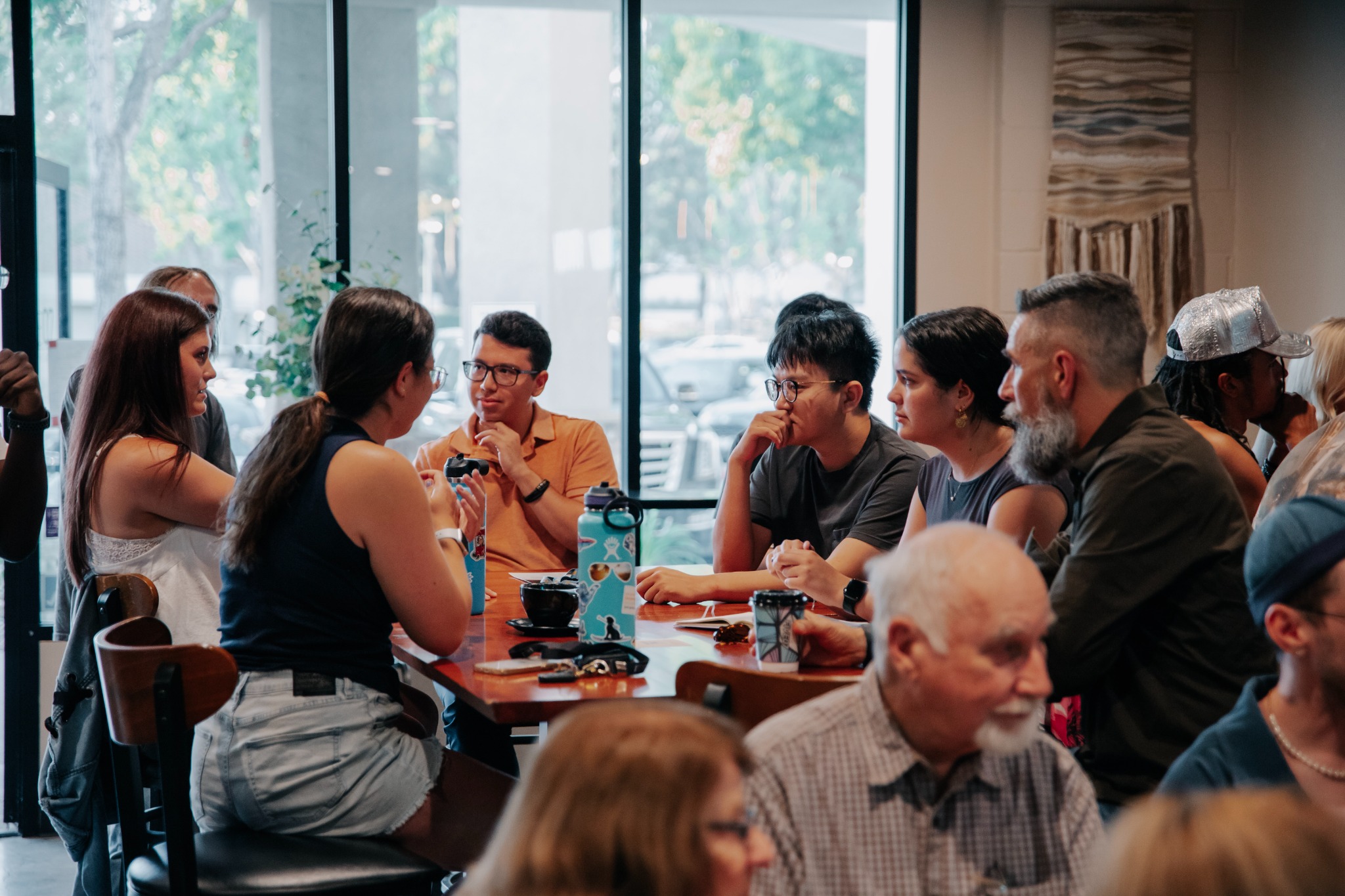 Agora attendees learning together through structured discussion
